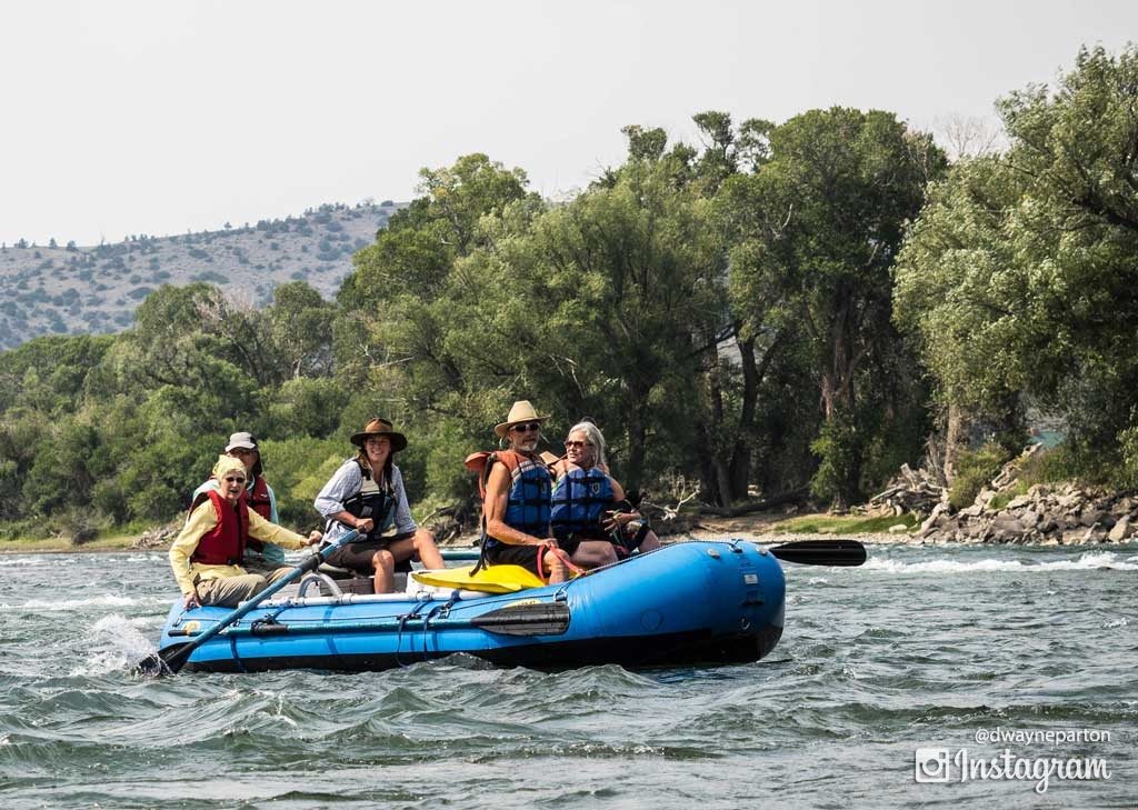 mikayla_guiding_the_raft